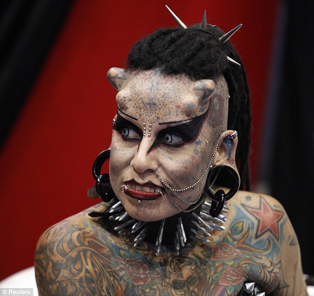 The Mexican'vampire mother' Maria Hose with titanium horns and tattoos