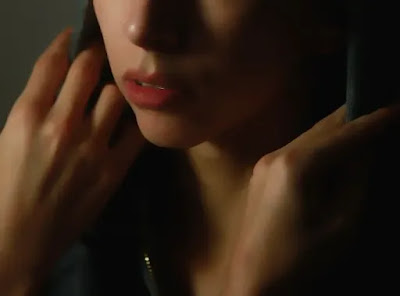 An image of a face of a girl with red lipstick and hands near the neck- sad girl dp