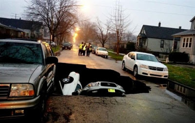 Ground (Sinkhole) Opens In Chicago, Swallowing 3 Cars