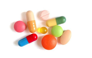 Image of unbranded capsules and tablet medications