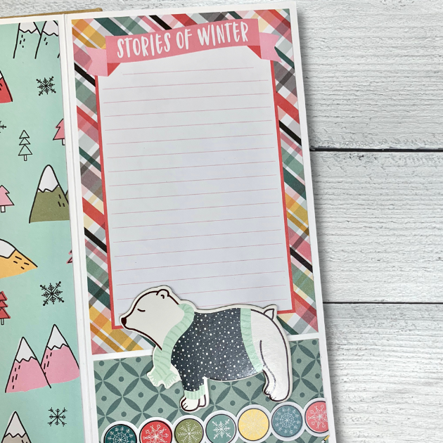 Freezin' Season winter scrapbook album page with a polar bear, mountains, & snowflakes