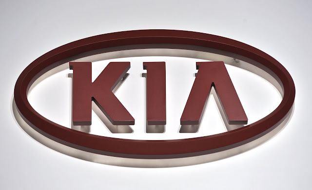 kia logo displayed at 2011 naias detroit