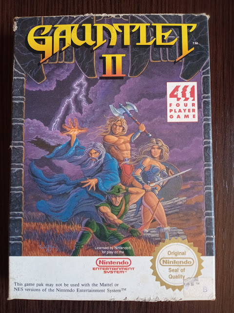 Caja del juego Gauntlet II de Nintendo NES por delante