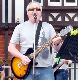 Ian Cawsey of The Moggies band performing in Brigg town centre