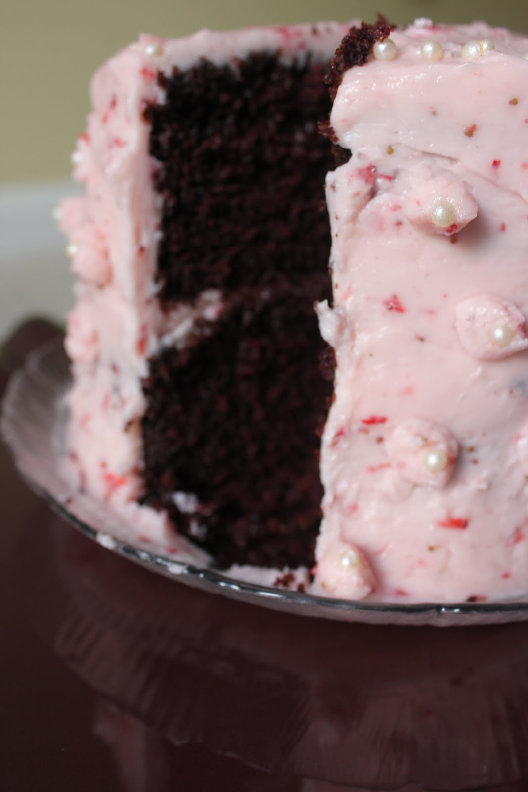 chocolate cake with chocolate frosting and strawberries Make this frosting with any berry you desire! You can customize the 