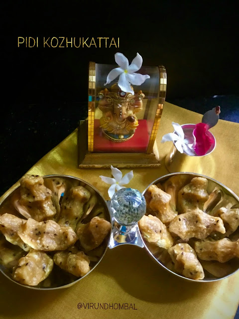 Sweet Pidi Kozhukattai | Rice Dumplings with Jaggery - Sweet Pidi Kozhukkatai - a classic prasadam recipe for pooja made with raw rice, jaggery, coconut, moong dal and black sesame seeds. This Pidi Kozhukkatai is a popular kozhukattai dish with different variations, although the most common method is prepared with the freshly prepared homemade rice flour as we do for maa vilakku. As I said in my previous posts, the coconut adds a great flavour to the jaggery based desserts.