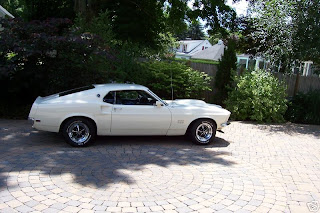 white luxury car Ford Mustang Boss 429