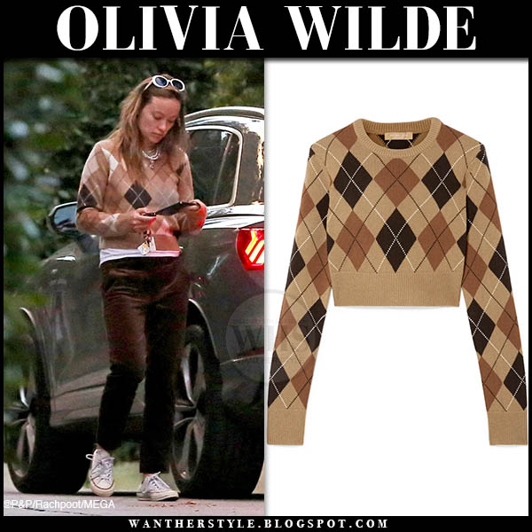 Olivia Wilde in brown argyle sweater and white sneakers
