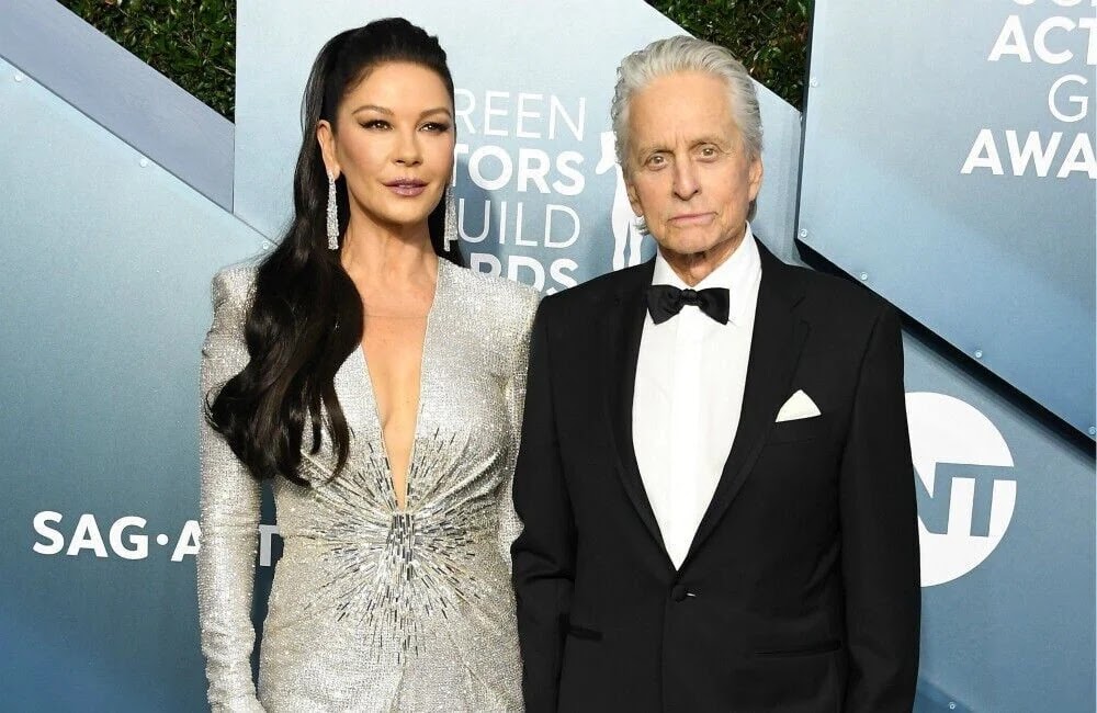 Catherine Zeta-Jones and Michael Douglas rent an apartment in one of London's oldest mansions International reports revealed that the duo Catherine Zeta-Jones and Michael Douglas moved to live in a new apartment in St. James's Palace, which is the oldest palace in London, according to the Daily Mail report about the duo, stressing that they preferred to live in the royal way recently.  The report added that the prominent couple in the world of Hollywood recently rented an apartment in the oldest mansion in London to be their base in the city.  On the other hand, actor Michael Douglas had previously been keen to celebrate his wedding anniversary with his wife, the beautiful star Catherine Zeta-Jones, through his Instagram account, and published a picture of them together at the end of last year, in which the couple appeared from their wedding 22 years ago, on the nineteenth of November. the past.  Douglas also made sure to celebrate with a message he also addressed to her, in which he said: "I love you so much. Happy anniversary to us, Catherine."  On the other hand, Catherine Zeta-Jones celebrated her 53rd birthday earlier in September last year, after she engraved her name in golden letters as one of the most important Hollywood stars who were famous for their distinguished roles during a long artistic career that won her many awards, which reflected her talent in the world of the acting.