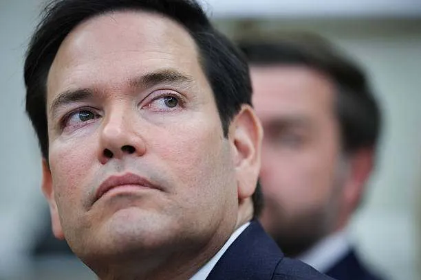 Secretary of State Marco Rubio listens as U.S. President Donald Trump speaks in the Oval Office of the White House on April 14, 2025, in Washington, D.C. Photo by Win McNamee/Getty Images