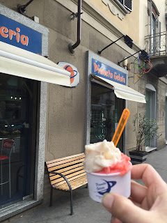 me holding banana and strawberry gelato outside Pianeta Gelato in Torino, Italy