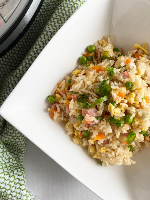 Leftover ham in a delicious fried rice with eggs, veggies and Asian sauces.