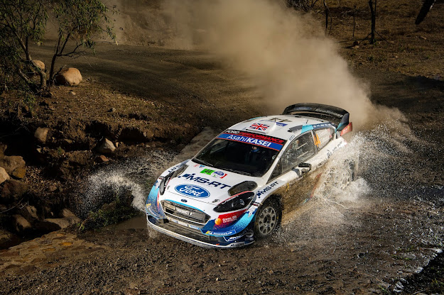 Ford Fiesta World Rally Car through water splash