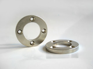 http://www.senmagnetics.com/products/Neodymium-ring-magnets.htm