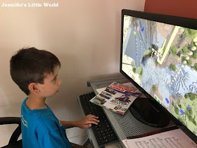 Child playing Minecraft on the computer