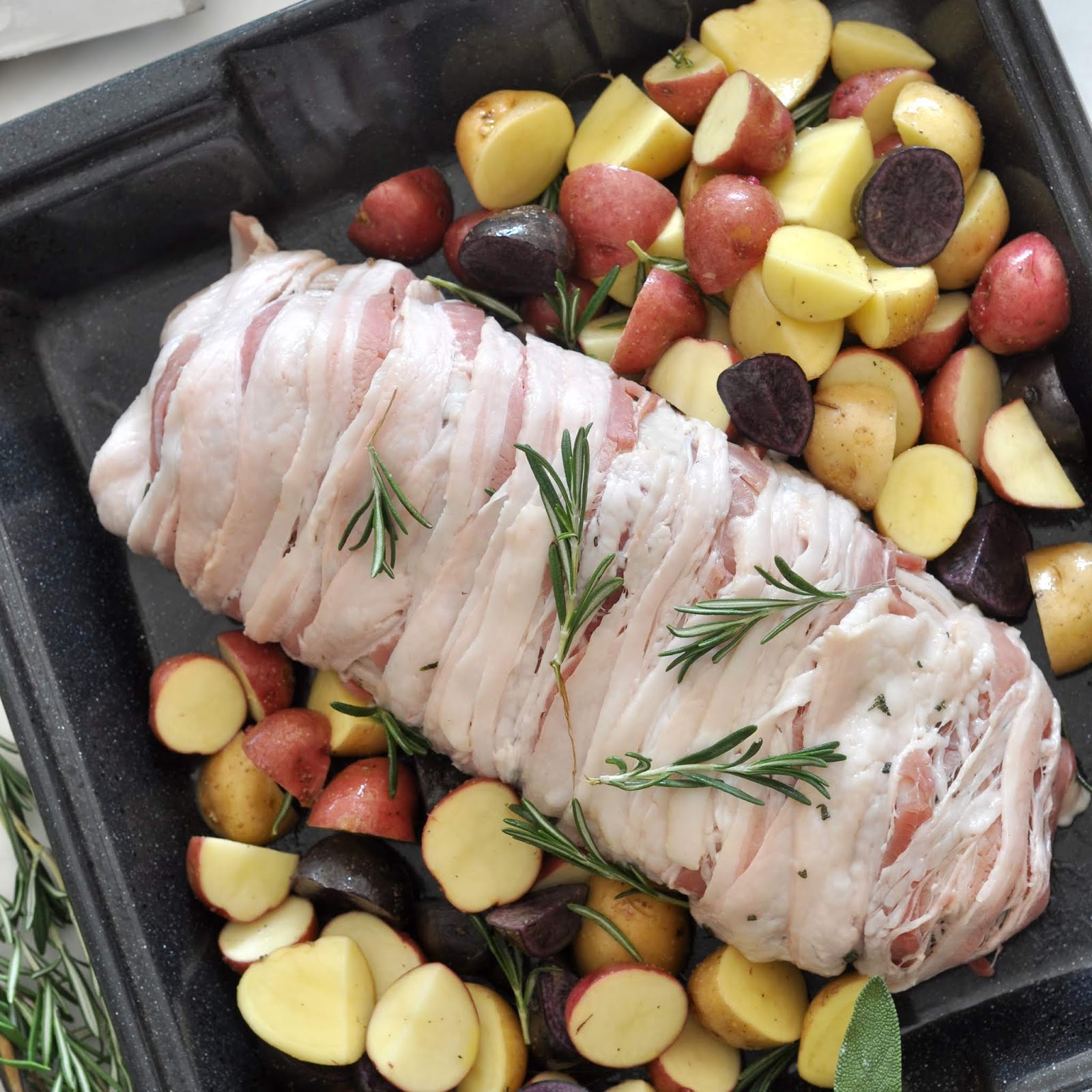 Bacon Wrapped Pork Roast with Roasted Potatoes and Sauteed ...