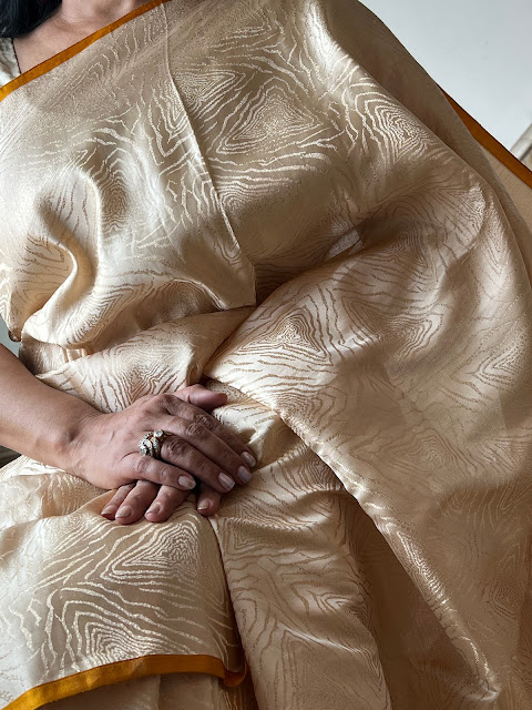 Golden Elegance: The Modern Tissue Silk Tanchoi Saree with a Polka Dots Twist