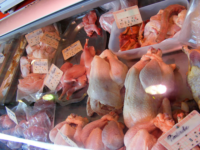 Poultry and rabbit for sale at a market.  Indre et Loire, France. Photographed by Susan Walter. Tour the Loire Valley with a classic car and a private guide.