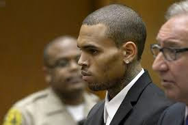 CHRIS BROWN SETTLES TWO LAWSUITS