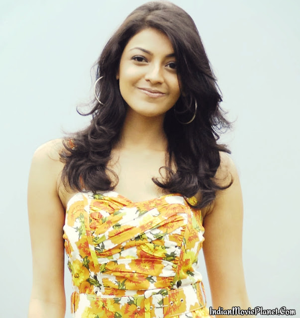 kajal agarwal hot photo shoot stills in yellow dress 
