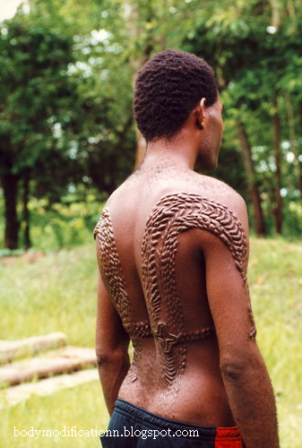 scarification tattoo. scarification tattoo.