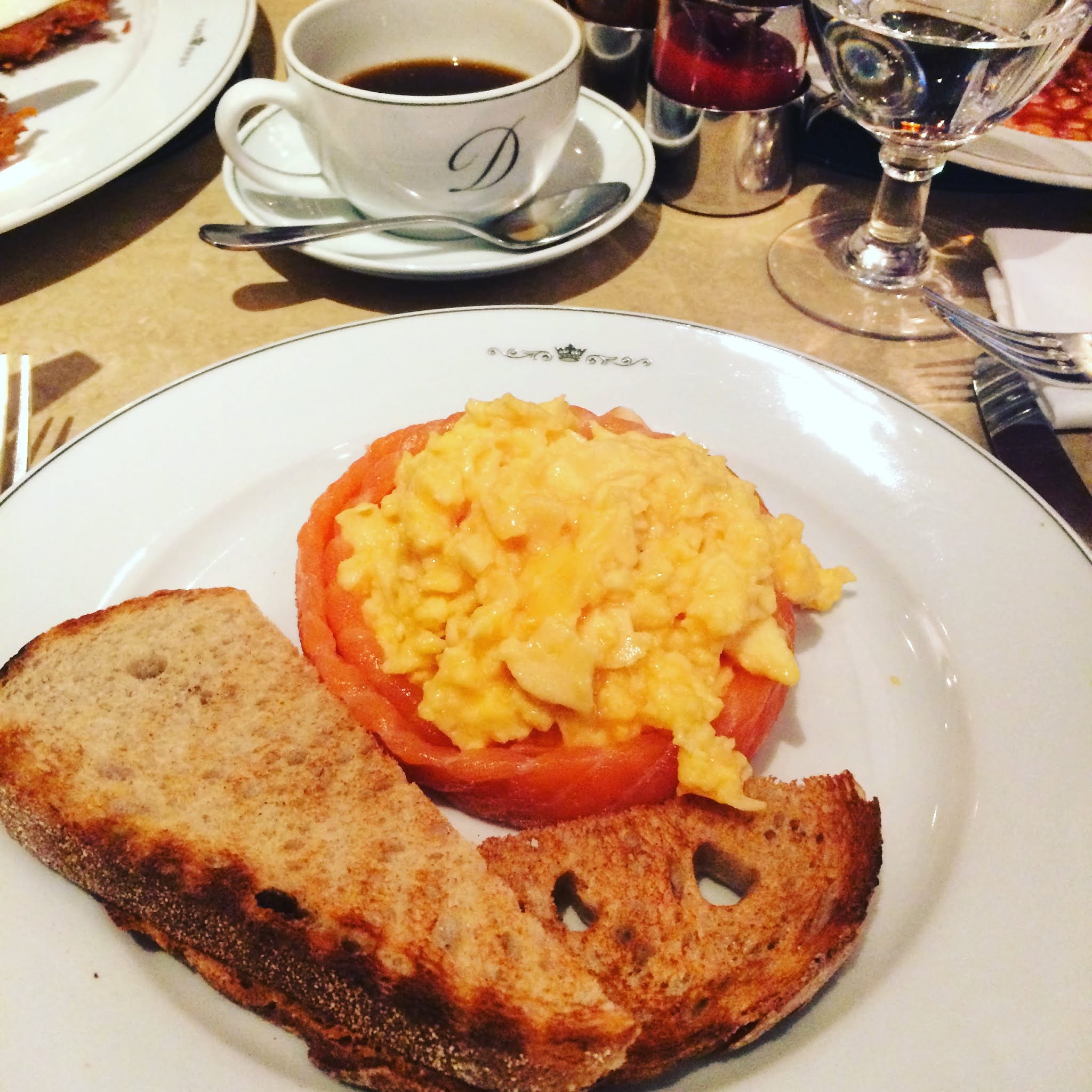 A plate of smoked salmon and scrambled eggs at The Delaunay, one of the best places for an early london breakfast