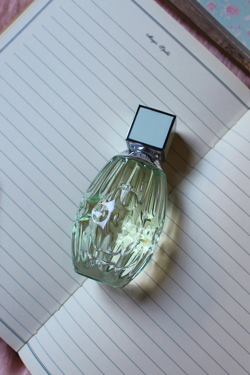 close-up of a jimmy choo floral bottle of perfume