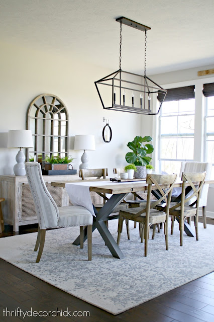 Dining room with light wood and metal accents 