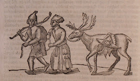 Woodcut of a man and woman leading a reindeer