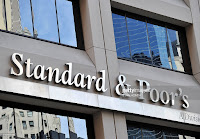 Standard & Poor's headquarters in the financial district of New York on August 6, 2011. The United States' credit rating was cut for the first time ever August 5 when Standard and Poor's lowered it from triple-A to AA+, citing the country's looming deficit burden and weak policy-making process. (Credit: AFP Photo/Stan Honda) Click to Enlarge.