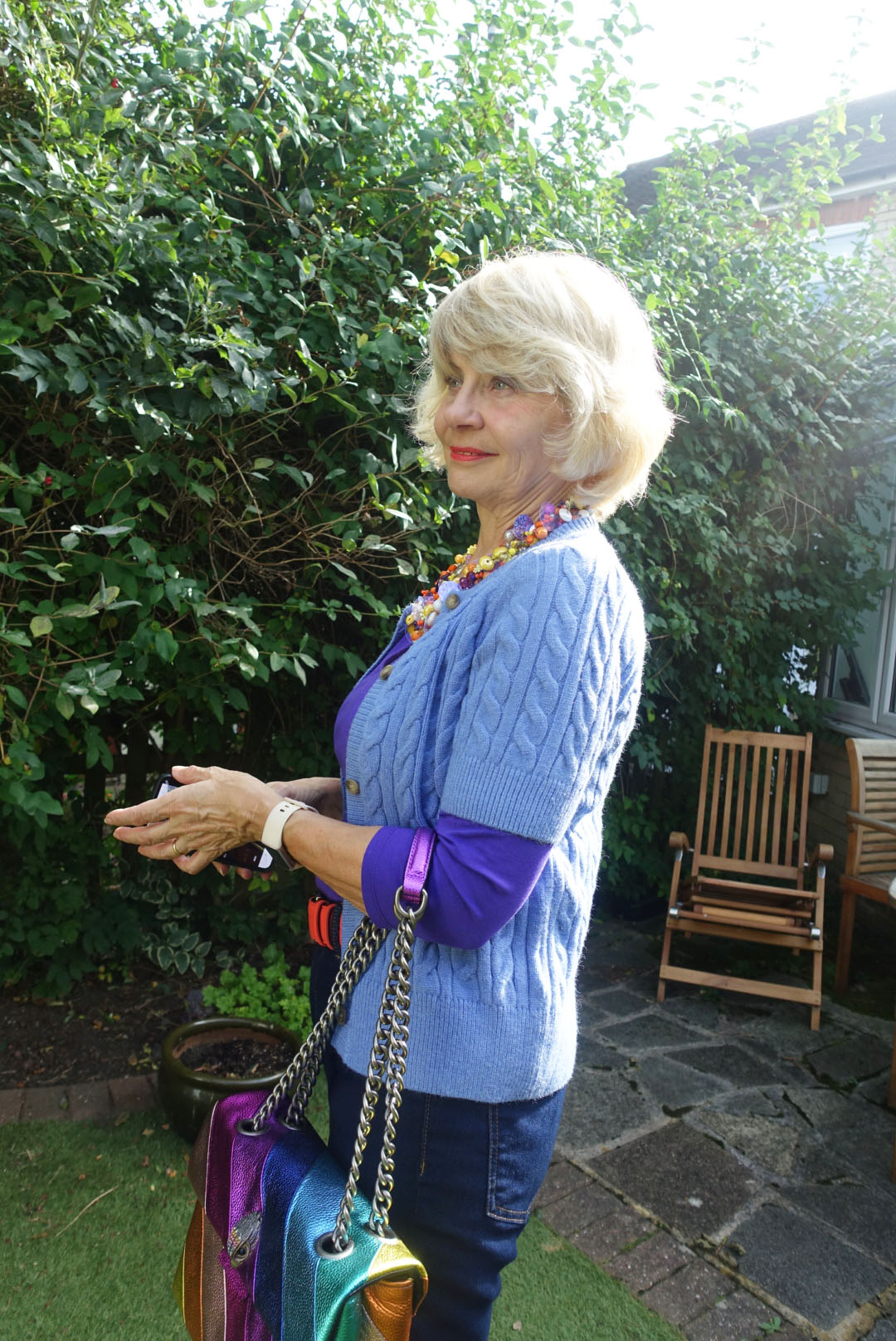 A colourful look for a short sleeved cabled cardigan worn by Gail Hanlon from Is This Mutton