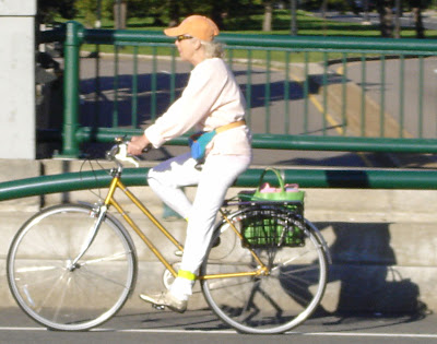 older lady on a bike