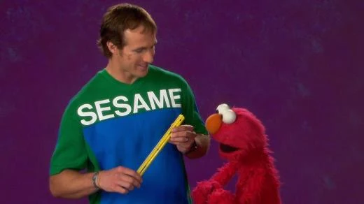 Drew Brees is in the Sesame Street Episode 4274. Drew Brees talks about measure with Elmo.