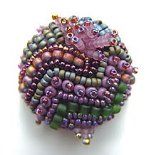 beaded button by Robin Atkins, bead artist