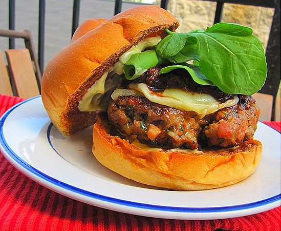 Pork-Chorizo-Bacon Burger with Manchego Cheese, Romesco Sauce, Aioli & Arugula