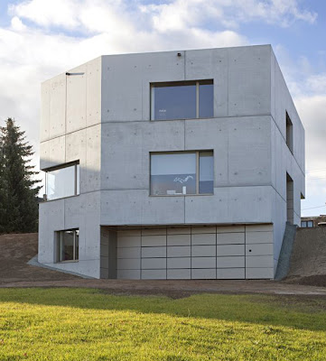 fachada de cemento en casa minimalista