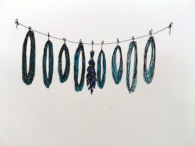 A horizontal pen drawing on white paper, showing eight evenly-spaced hanks of yarn in a gradation from dark teal to pale, with a bundle of dried indigo leaves in the middle, all hanging from a string.