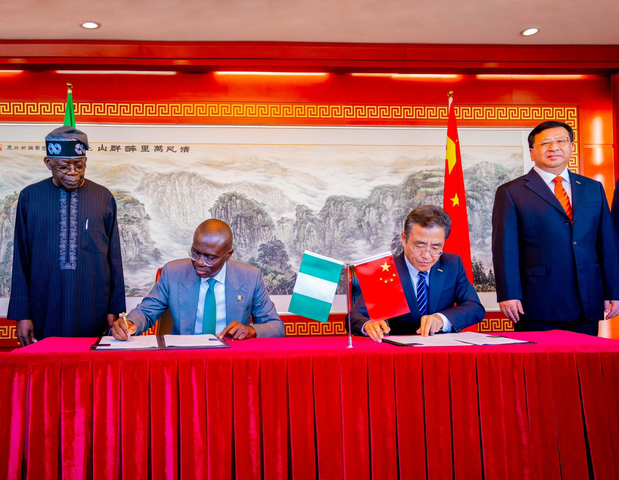 Governor of Lagos State, Babajide Sanwo-Olu, signs MoU with CCECC to build Lekki-Epe Link Bridge in Lagos. President Asiwaju Bola Ahmed Tinubu witnesses the signing of the MoU