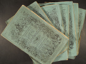 A stack of paper-bound issues of David Copperfield.