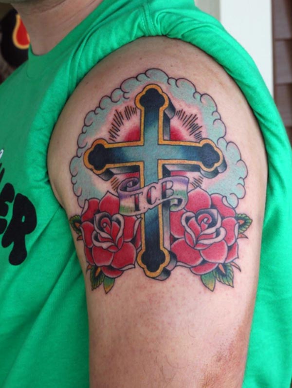 This is great and attractive traditional cross tattoo art