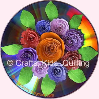 Paper flowers on a CD