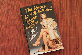 The Road to Happiness Is Always Under Construction Linda Gray