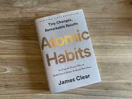 Atomic Habits james clear everyone in the comments were telling me to read this for probably a year since it came out and i was like i'll get to it and then I finally did and i was like holy moly that's a great book but it talks about this right here the goal is not to stop reducing cigarettes actions the goal is to become a non-smoker