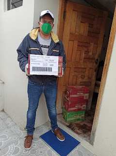 Jonathan Poma doing a delivery in Loja Ecuador