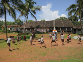 Playing with kids in a village school