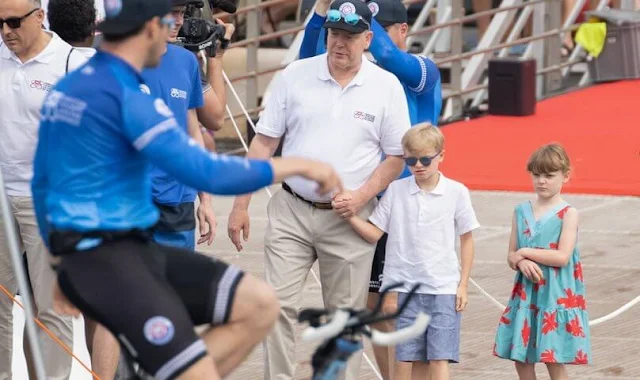 Princess Gabriella wore a blue v-neck print dress by Jacadi. Crown Prince Jacques and Princess Charlene