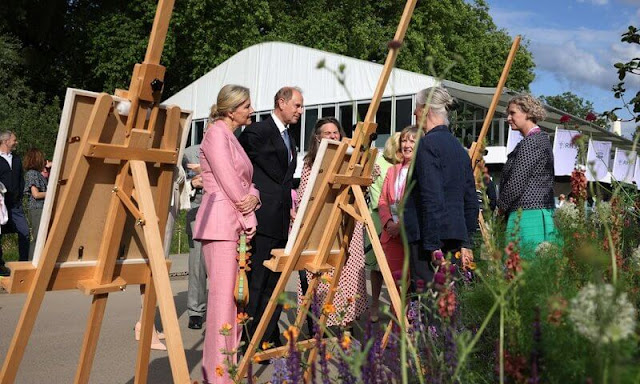 The Countess of Wessex wore Angela blazer and Vesta trousers by Gabriela Hearst,  Princess Beatrice wore a Carolena fresh flowers dress by Reformation