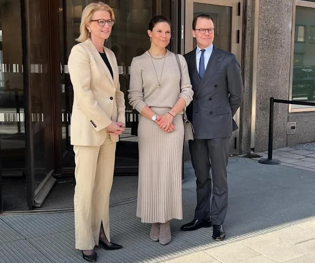 Crown Princess Victoria wore a ribbed o-neck jumper and pleated skirt by Soft Goat. Minister for Finance Elisabeth Svantesson