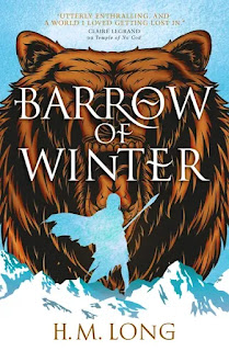 Book "Barrow of Winter" by HM Long. In the centre, the enormous head of a beats, with brown fur, its mouth gaping wide. Standing in front of it, her back to us and facing the animal, is the silhouette of a woman in blue-white. She is wrapped in flowing robes and holds a spear. Her feet rest on snowcapped mountains.