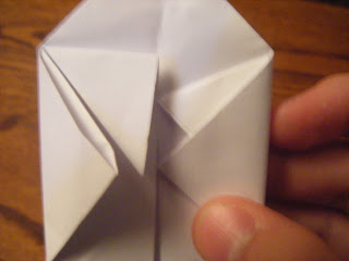 Stages of making a paper balloon